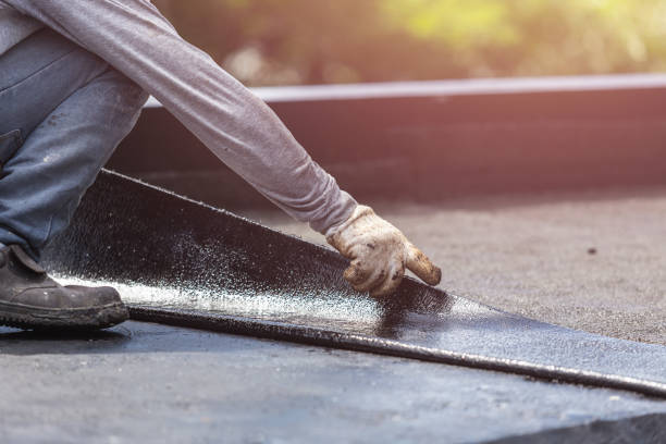 Professional Basement Waterproofing technician working in Wellston, OH